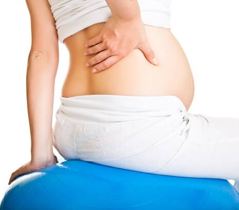 Dores na coluna em mães e gestantes: como evitar?}